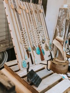 an assortment of jewelry on display in a shop