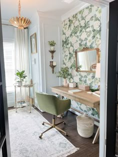 a room with a desk, chair and mirror in the corner near a rug on the floor