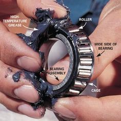 the parts of a wheel being held by two hands