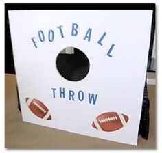 a football throw sign is hanging on the wall