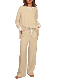 PRICES MAY VARY. ✔Design: Two-Piece Set/Long Sleeve Pullover Tops/Round Neck/Solid Color/Long Leg Pants/wide Foot/Lightweight/Loose Fit/Two Piece Tracksuit Set/Loungewear Set/Jogger Set/Drawstring Waist/High Waist/Winter Outfits For Women/Fall Fashion Clothes For Women 2023 ✔Soft Fabric: Quality Is Our First Consideration. After A Long Time Of Consideration And Selection Of Fabrics, We Adopt A Soft And Lightweight Fabric To Give You A Wonderful Wearing Experience. More Importantly,Please Wash It Size 12 50 Yo, Womens Cashmere Jogging Suits, Affordable Casual Crew Neck Sets, Cheap Women's Matching Pant Set, Luxury Wide Leg Pants For Loungewear In Fall, Cheap Casual Sets In Solid Color, Cheap Women's Matching Set Tops, Affordable Fall Leisure Tops, Affordable Spring Loungewear Shirt