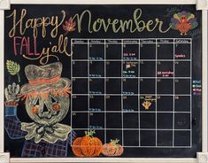 a chalkboard calendar with an image of a scarecrow and pumpkins on it