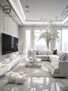 a modern living room with white furniture and flowers in vases on the coffee table