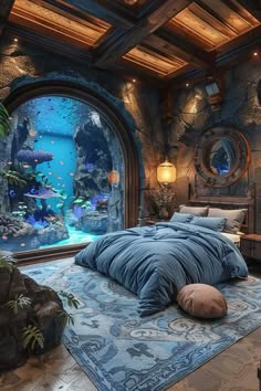 a bedroom with an aquarium in the wall and a bed on top of it that has a blue comforter