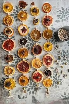 oranges and other fruits are arranged on a table