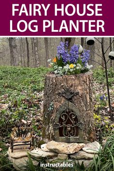 a fairy house log planter with flowers in it