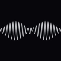 a black and white photo of a sound wave in the dark with no one around it