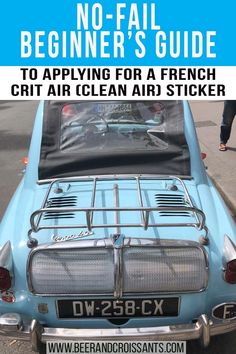 an old blue car with the hood open and text overlay reads no fail beginner's guide to applying for a french crit air clean air sticker