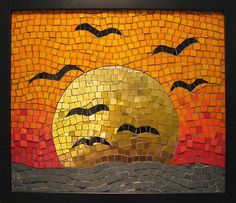 a mosaic painting with bats flying over the sun and seagulls in front of it