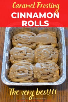 cinnamon rolls with icing in a baking pan on a wooden table and text overlay reads caramel frosting cinnamon rolls the very best