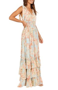 This elegant tie-strap maxi is designed in romantic blooms and centered with a shaping smocked waist. Its flowy skirt is accented with frothy tiered ruffles for an enchanting silhouette. Surplice V-neck Tie straps Sleeveless Smocked waist Lined 100% polyester Hand wash, dry flat Imported Tiered Maxi Dress, Flowy Skirt, Maxi Dress Blue, Nordstrom Dresses, Blue Floral, Smocking, Neck Tie, Ruffles, Top Brands