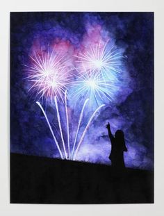 a person standing in front of fireworks on a dark night with purple and blue colors