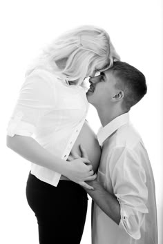 a man and woman kissing each other in front of a white background with the caption google image result for htp?