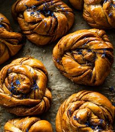 freshly baked cinnamon buns with blue sprinkles