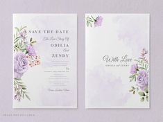 two wedding cards with watercolor flowers and greenery on the front one is purple