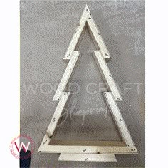 the wooden triangle is being assembled to be used as a wall hanging or display piece