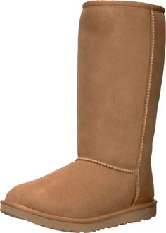 PRICES MAY VARY. Waterproof classic boot Sheepskin lining Rubber sole Ugg Classic Tall, Ugg Classic Short, Boots Ugg, Kids Uggs, Ugg Classic, Classic Boots, Kids Luggage, Luxury Store, Tall Boots