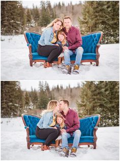 three people are sitting on a blue couch in the snow with their arms around each other