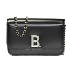 This wallet on chain is crafted with a shiny and smooth black calfskin leather. The fold-over flap top magnetic snap closure opens to a black leather lined interior with a bill slot, credit card slots, and a zipper pocket. The detachable silver-tone chain allows for this piece to be carried on the shoulder or as a clutch. This chic wallet on chain is perfect for day or a night out, with the distinctive style and quality of Balenciaga! Model: 593615 Black Smooth calfskin leather Antique silver-to Balenciaga Black, Wallet On Chain, Chain Wallet, Silver Logo, Balenciaga Bag, Wallet Chain, Leather Silver, Wallet Bag, Lambskin Leather