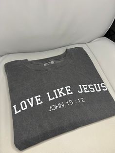 LOVE LIKE JESUS Comfort Colors Tshirt Brand- Comfort Colors Sizing- Unisex (see size guide in photos for measurements) Color- Espresso, Moss, Pepper, Sage, Sandstone, & Blue Jean (pictured) Font Color- White Material- 100% Cotton; garment dyed for that lived in feel and almost no shrinkage at home *Product sold as shown, message me to ask about personalization (quote, shirt color, or font color change)* Processing/Turn around Time- -Processing/Turn around times may vary. Typically 3-5 business d Bleach Shirt Diy, Faith Tshirts, Love Like Jesus, Christian Tshirt, Comfort Colors Tshirt, Jesus Tshirts, Diy Shirt, Faith Based, Comfort Colors