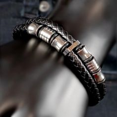 Black leather bracelet with silver metal accents and clasps. Black Leather Punk Bracelets, Black Leather Strap Punk Bracelets, Black Leather Double Band Bracelets, Edgy Black Leather Band Bracelet, Stainless Steel Fittings, The Punch, Men's Bracelets, Pearl Choker Necklace, Naha