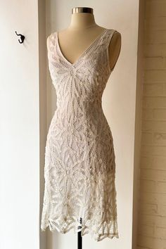 New and never worn with original tags. Elegant white lace slip dress embellished with subtle beaded detailing. V neck and back. Slip on. Fits size S Excellent condition Beaded Vintage Wedding Dress, Rehearsal Dinner Dress Vintage, 1920s Slip Dress, Embellished Sleeveless Lace Dress, Fitted Sleeveless Embellished Lace Dress, Elegant Embellished Summer Lace Dress, Fitted Sleeveless Lace Dress With Sequins, Fitted Beaded Lace Dresses, 90s White Dress