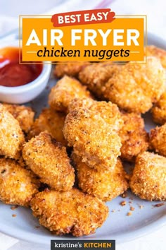 fried chicken nuggets on a plate with ketchup