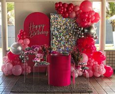 a birthday party with balloons and decorations