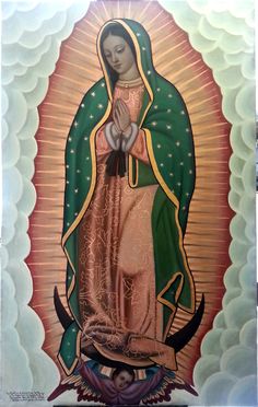 an icon of the virgin mary in gold and green