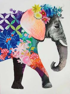 an elephant with flowers painted on it's back