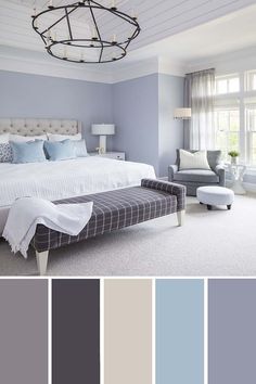 a bedroom with blue and gray colors in the walls, carpeted flooring and furniture