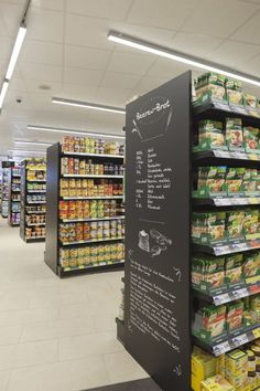 an aisle in a grocery store filled with lots of food