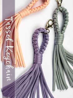 three tasselled key chains with different colors