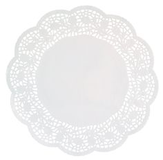 a white doily on a white background