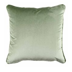 a light green pillow on a white background