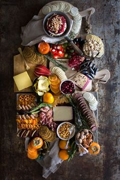 a table topped with lots of different types of food