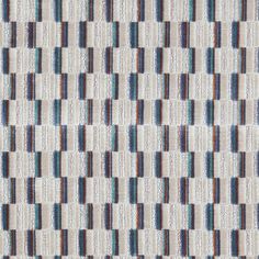 a white and blue checkered fabric with vertical stripes