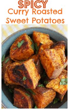 the recipe for curry roasted sweet potatoes in a blue bowl