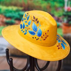 Hat Burning, Blue Foliage, Brown Accessories, Painted Hats, Poncho Shawl, Caribbean Blue, Paint Projects, Leaf Motif, Mens Jewelry Necklace