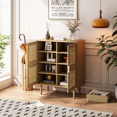 a living room with a plant and an open shelf on the floor next to it