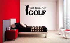 a bedroom with a golf wall decal on the wall