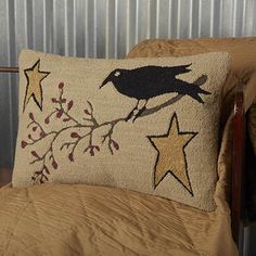 a pillow that has a bird on it