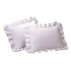 two white pillows with ruffles on them