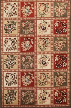 a red and beige rug with many different designs on the front, back and sides