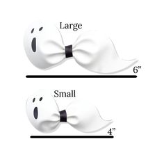 two white bow ties with faces drawn on them, one is larger and the other is smaller