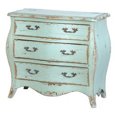 an old chest of drawers with rusted paint on the top and bottom drawer,