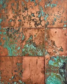 an old rusty metal plate with blue and green paint on it's surface photo