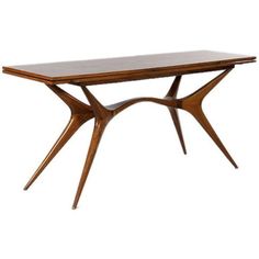 a wooden table with two intersecting legs and a rectangular top, on an isolated white background