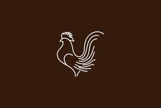 a white rooster on a brown background with the word's logo in the center