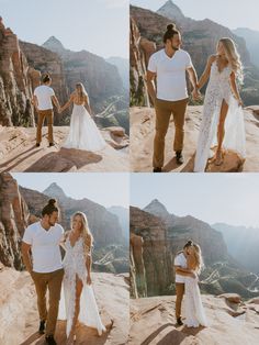 a couple holding hands while standing on top of a mountain in front of some mountains